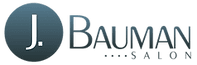 Logo of j. bauman salon featuring a stylized, metallic blue circle with a large white 'j' on the left, and the text "bauman salon" in grey beside it.